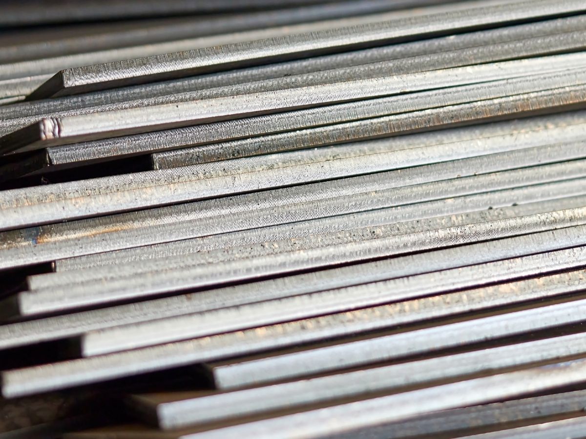 Stainless steel sheet being sheared to size on a guillotine